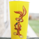 Yellow Nesquik cup with Quicky the Bunny on it